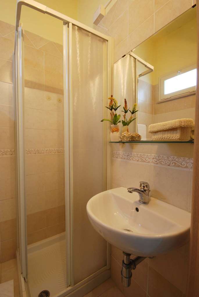 Hotel Caggiari Сенигаллия Номер фото